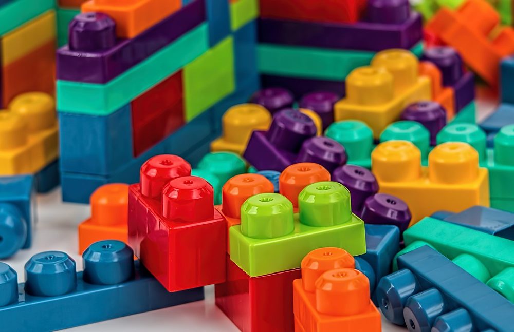 A heap of chunky coloured building bricks